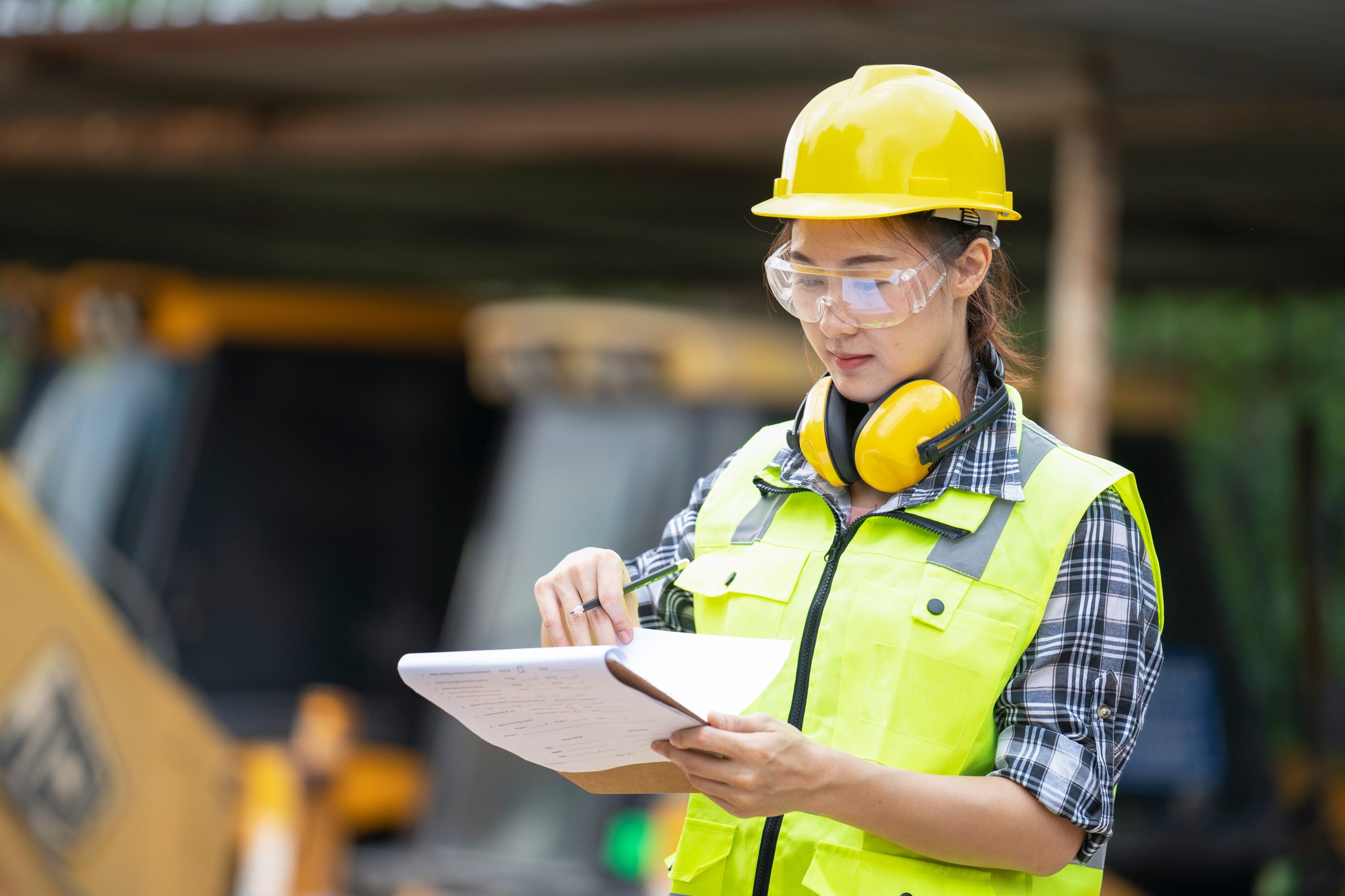 A female construction engineer at construction site A female construction engineer at construction site
